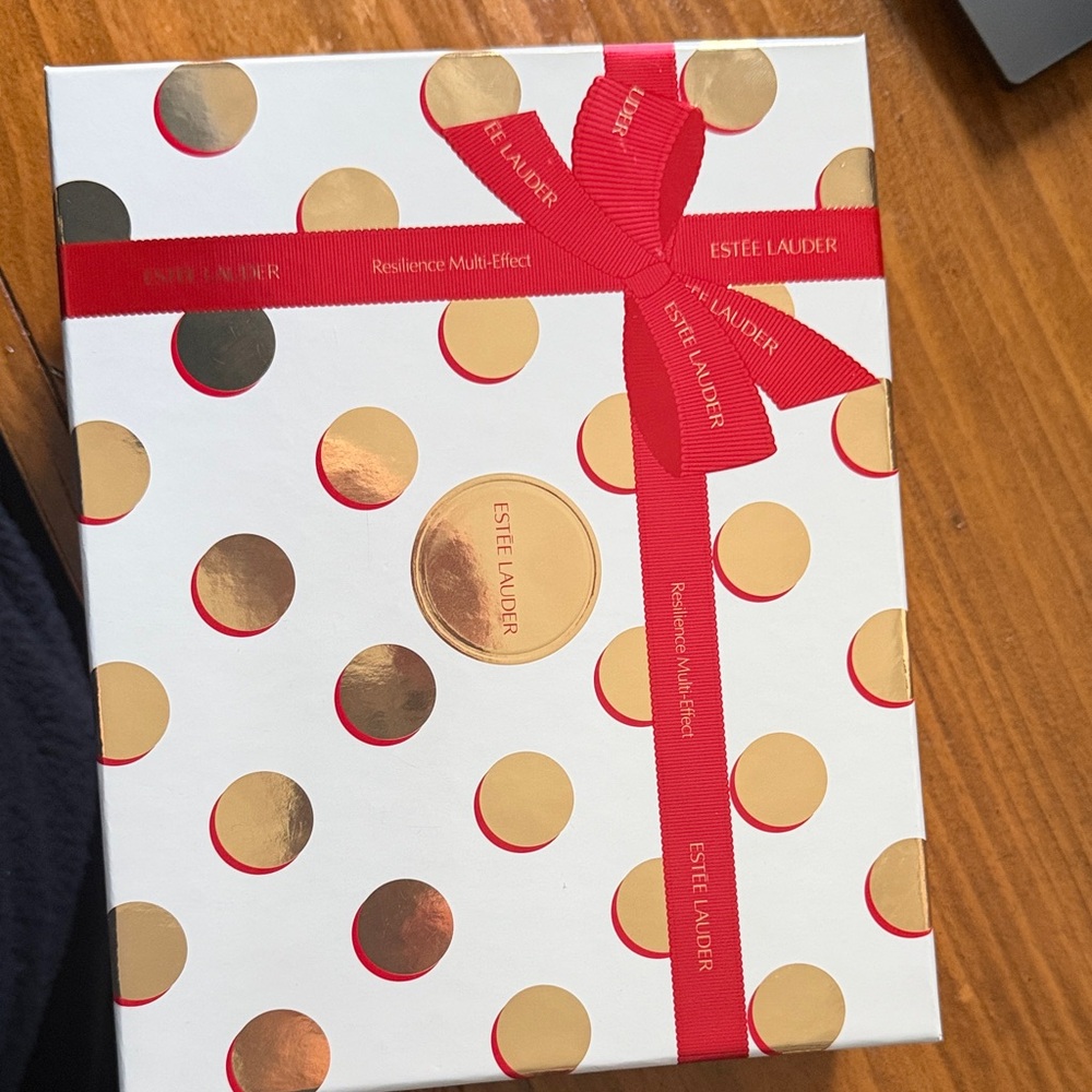Estee Lauder Skincare Gift Set with Red and Gold Accents